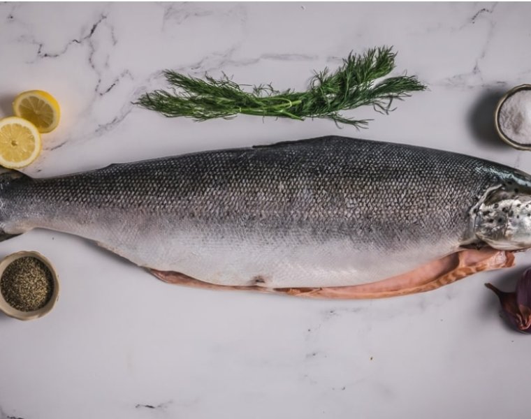 Fresh Gutted red trout with head